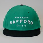 [新色追加]SAPPORO HOOD REPRESENT SNAP BACK CAP[GREEN×BLACK]